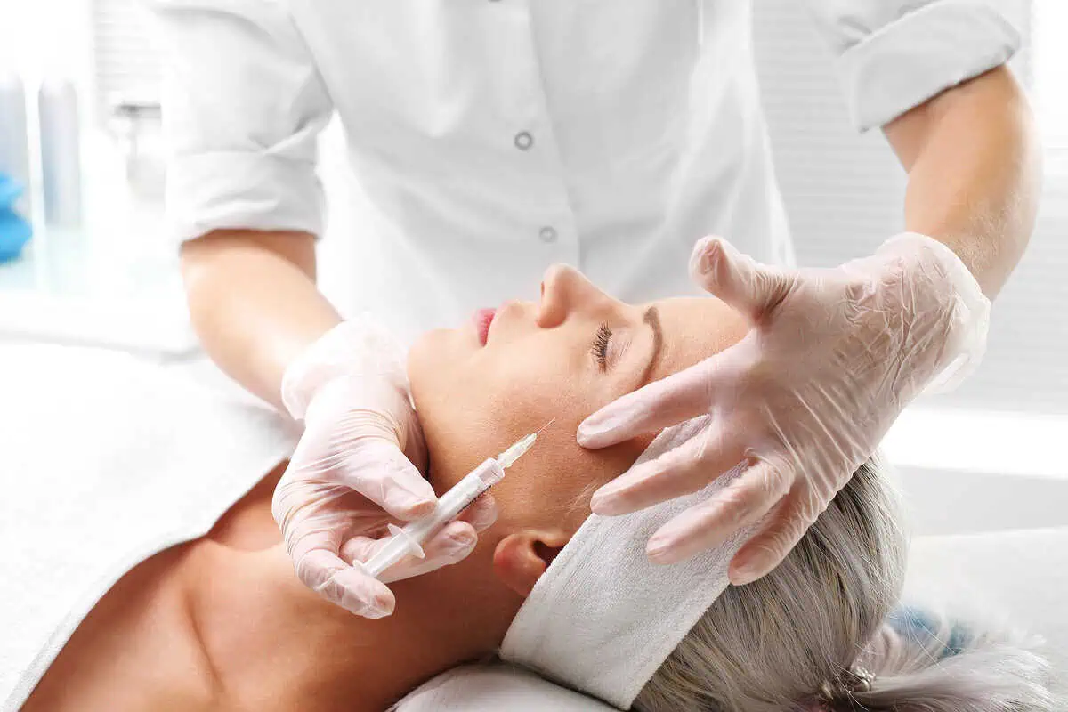A Woman getting Sculptra injection for sagging skin | Elle Skin & Beauty Co. | Florence, KY