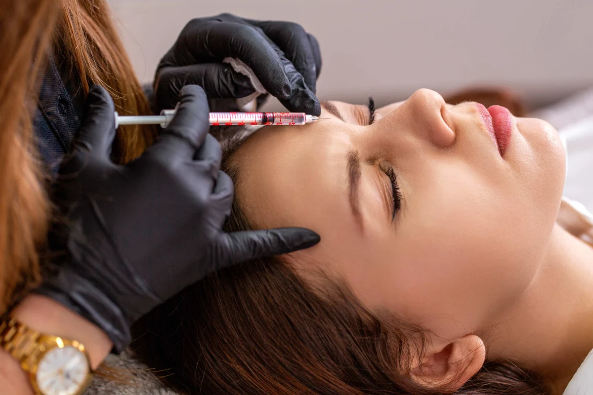 Woman receiving Botox injections for forehead wrinkles in Florence, KY at Elle Skin & Beauty Co.